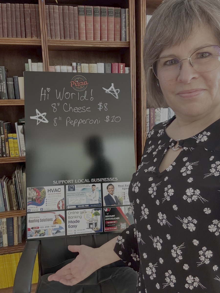 Terza Ekholm showing a Community Board with a writable venue area above local sponsor ads